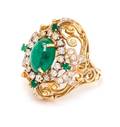 A Yellow Gold Emerald and Diamond Ring
