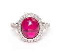 A 14 Karat White Gold Synthetic Ruby and Diamond Ring