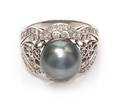 An 18 Karat White Gold Cultured Tahitian Pearl and Diamond Ring