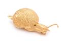 A 14 Karat Yellow Gold Snail Pin