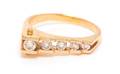 A 14 Karat Yellow Gold and Diamond Ring