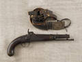 H Aston percussion pistol together with a postCivil War brass belt buckle