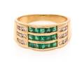 A 14 Karat Yellow Gold Emerald and Diamond Ring
