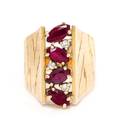 An 18 Karat Yellow Gold Ruby and Diamond Ring