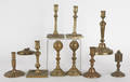 Group of miscellaneous brass candlesticks and oil lamps