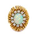 A Yellow Gold Opal and Diamond Ring