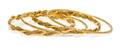 A Collection of Yellow Gold Bangle Bracelets