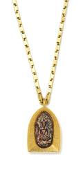 A High Karat Yellow Gold and Hardstone Buddha Amulet on High Karat Chain