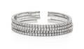 A Collection of 18 Karat White Gold and Diamond Cuff Bracelets Stefan Hafner