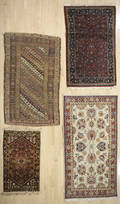 Four oriental throw rugs