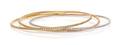 An 18 Karat Tricolor Gold and Diamond Triple Rolling Bangle Bracelet