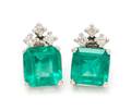 A Pair of White Gold Emerald and Diamond Stud Earrings