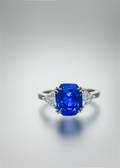 A Platinum Color Change Sapphire and Diamond Ring