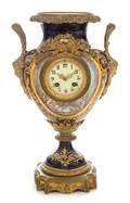 A Sevres Gilt Bronze Mounted Porcelain Clock