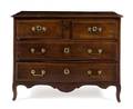 A Louis XV Provincial Walnut Commode