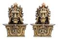 A Pair of Continental Giltwood Grotesque Masks