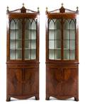 A Pair of George III Mahogany Corner Cabinets