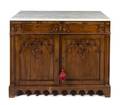 A Gothic Revival Walnut Cabinet