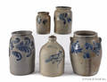 Four cobalt decorated stoneware crocks