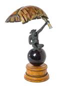 A Patinated Brass and Penshell Veneered Figural Table Lamp