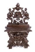 A Renaissance Style Carved Walnut Hall Chair
