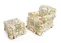 An Upholstered Armchair and Ottoman