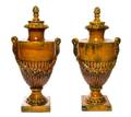A Pair of Glazed Terra Cotta Urns