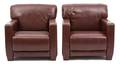 A Pair of Brown Leatherette Arm Chairs