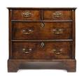 An English Chippendale Oak Four Drawer Chest of Drawers