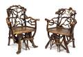 A Pair of Natural Branch and Limb Chairs