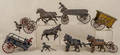 Collection of miscellaneous cast iron horse drawn wagons and horse teams