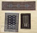 Three Oriental throw rugs