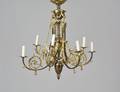 FRENCH GILT BRASS AND METAL SEVENLIGHT CHANDELIER