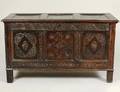 STUART CARVED OAK COFFER