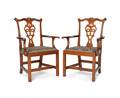 Pair of Eldred Wheeler Chippendale style curly maple armchairs