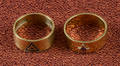 Two mens 14K gold bands with Masonic symbols