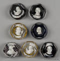 Seven Baccarat sulphide paperweights