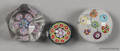 Three millefiori paperweights