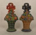 Pair of painted cast iron fruit basket doorstops 19th c