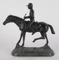 Contemporary bronze of a jockey and a horse