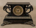 Ansonia painted iron mantle clock