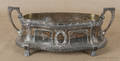 Silver plated planter with a brass insert