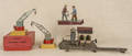 Painted tin windup railroad crossing