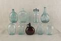 Eight aqua glass flasks