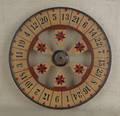 Painted doublesided gaming wheel late 19th c
