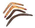 A Collection of Four Wood Boomerangs