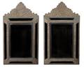 A Pair of Dutch Baroque Style Embossed Metal Mirrors