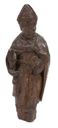 A Continental Carved Oak Figure of a Saint