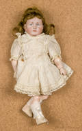 Kammer  Reinhardt bisque head doll with a pouty mouth