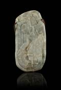 A Celadon Jade Plaque Carved with a Mexican Figure